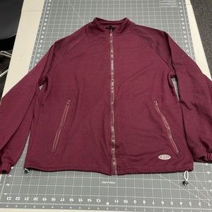 Women’s Burgundy warm up jacket.